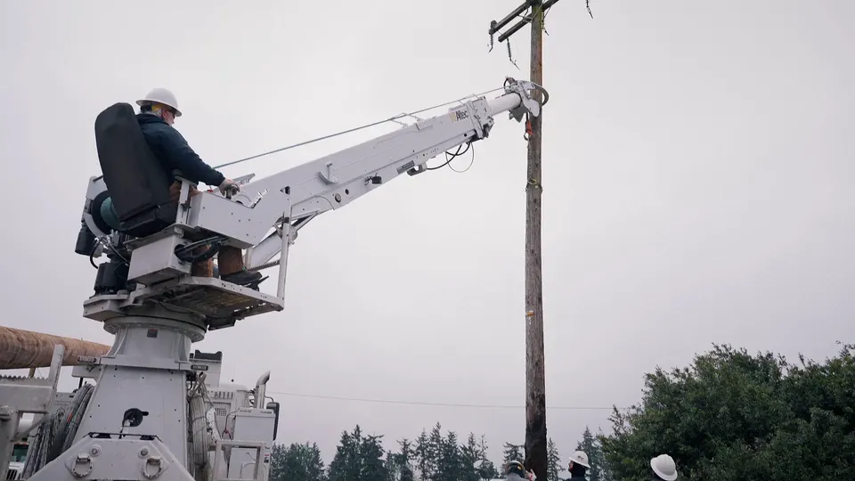 Utility lineman at work, from a customer engagement video